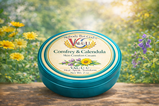 Val-U Comfrey & Calendula Skin Comfort Cream tin with a natural background of flowers