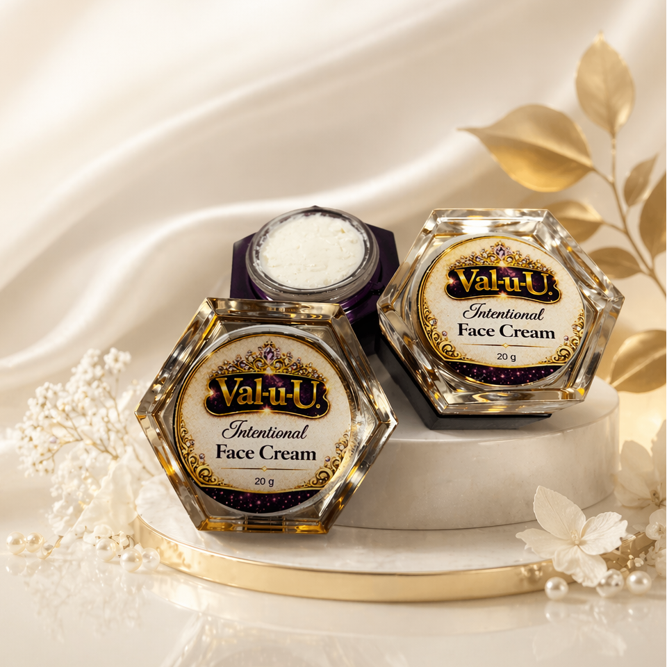 Two jars of Valu-U Intentional Face Cream on a white fabric background with gold accents.