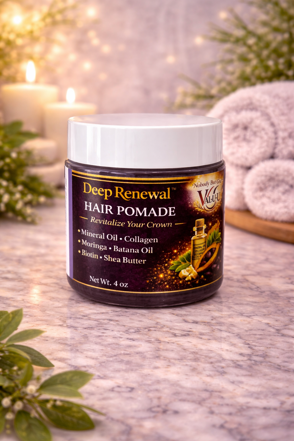 Jar of Deep Renewal Hair Pomade on a marble surface with decorative elements.