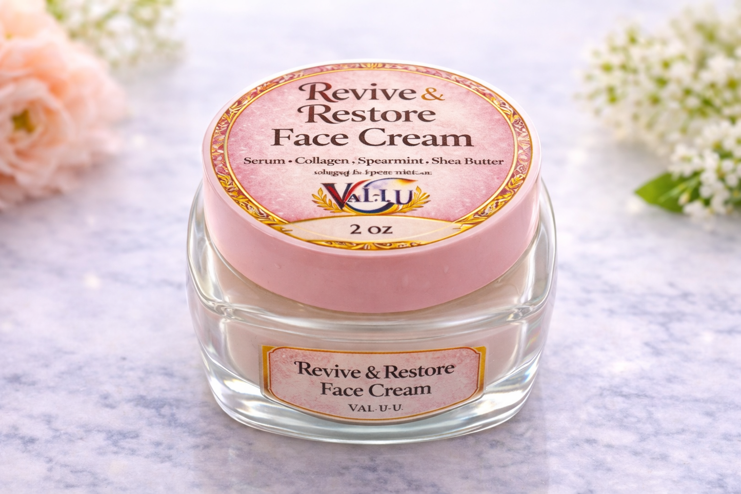 Jar of 'Revive & Restore Face Cream' with pink lid on a light background