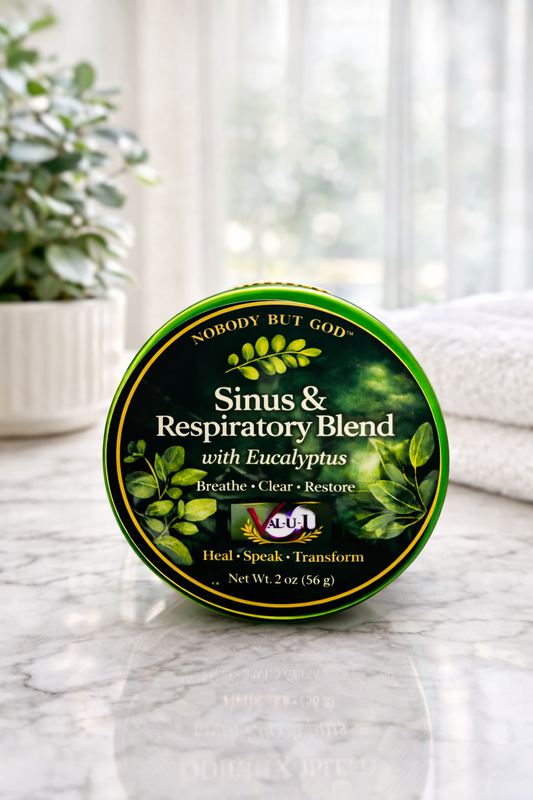 Container of 'Sinus & Respiratory Blend' with eucalyptus on a marble surface with a blurred background